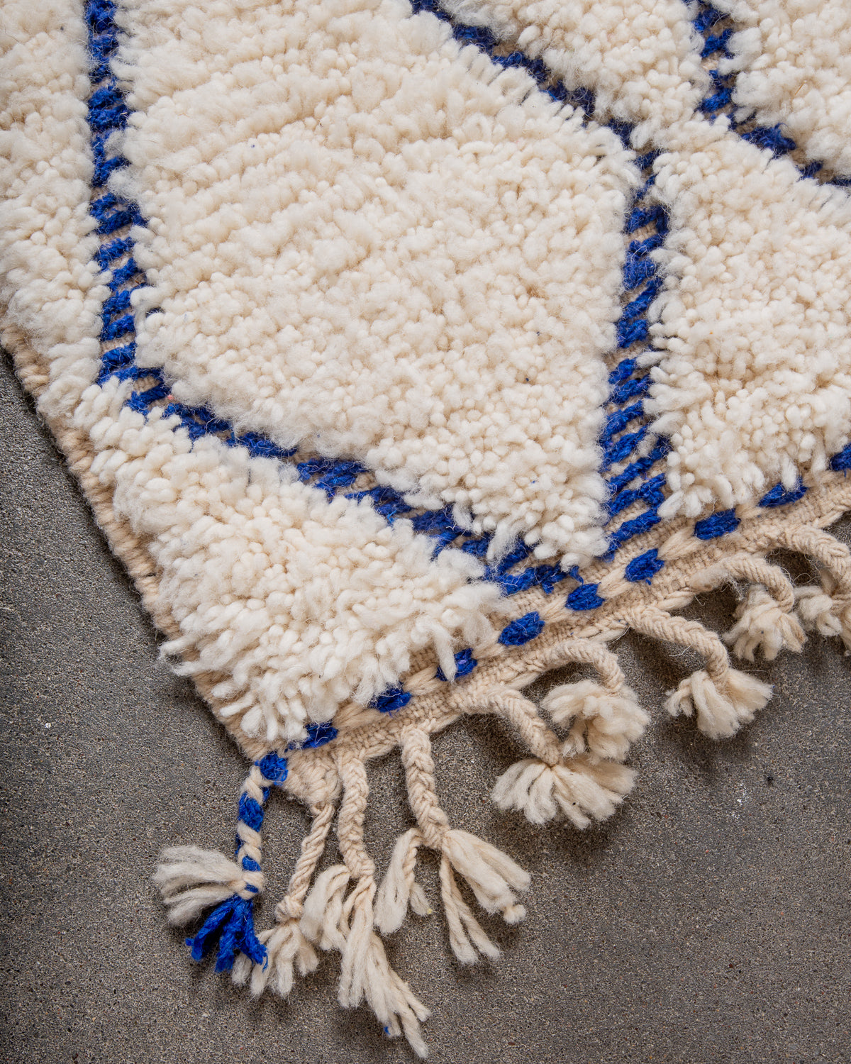 Modern, designer, handcrafted Berber rug from Morocco. Beniourain carpet with beautiful colours and patterns and fluffy wool texture.